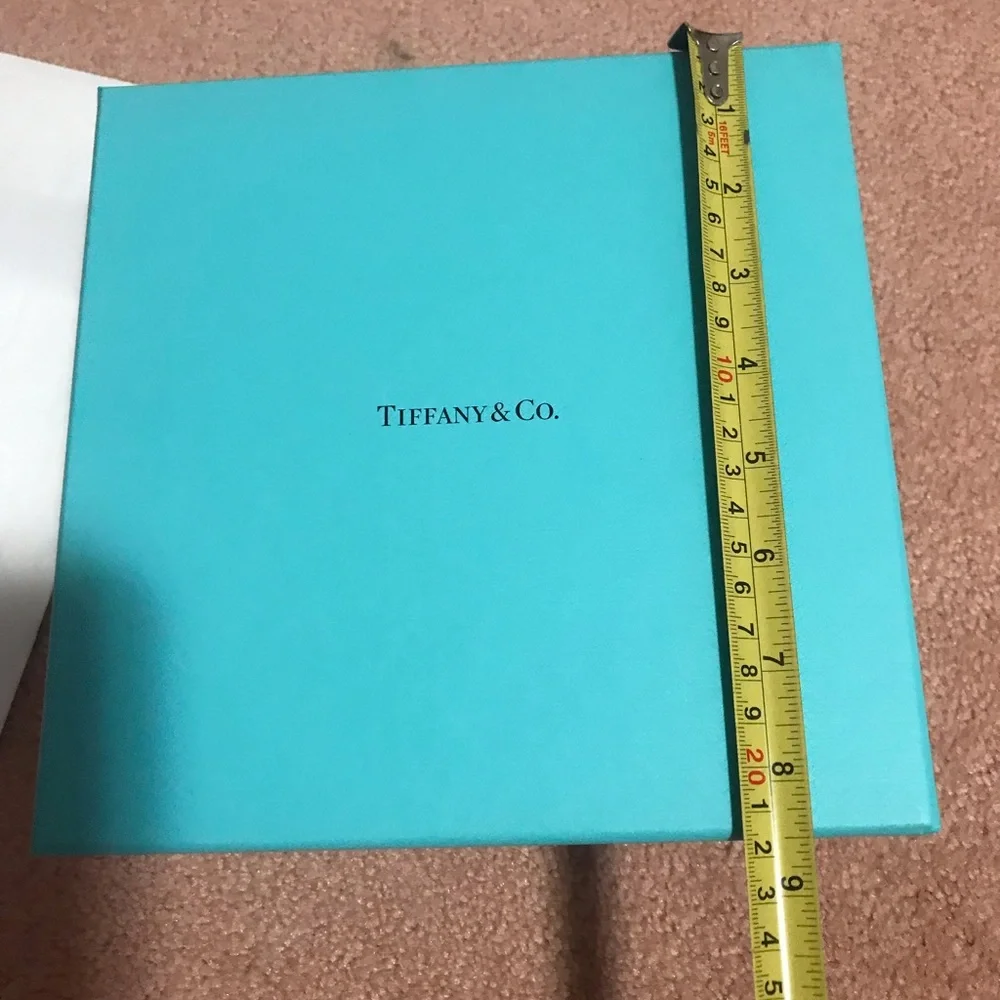 Tiffany box in very good condition plus a small bag of